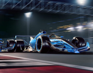 Two Racing Cars Moving At High Speed During Night Race